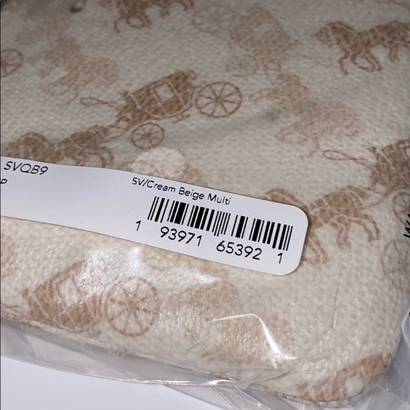 COACH Horse and carriage cream & beige wristlet - Picture 4 of 12